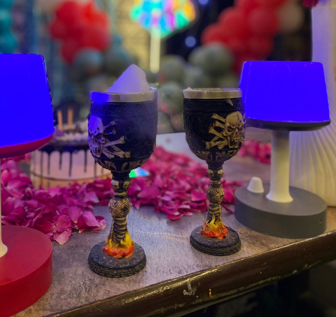 Themed cups on a celebration table